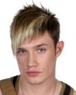 Spiky haircut with a clipper-cut side for men