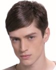 Short hairstyle with slick bangs for men