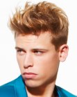 Men's hairstyle with short sides and a spiked crown