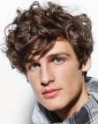 Men's hair with thick curls and high volume