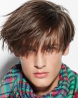 Men's cut with angled sides and long bangs