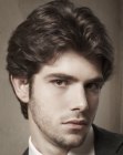 Short male haircut for wavy hair