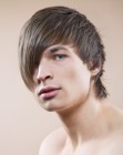 Razor-cut hair with a longer nape for men