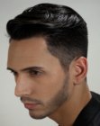Pomaded men's hair with a side part
