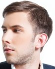 Haircut with military short sides and longer top hair
