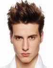 Short men's cut with spiky hair strands