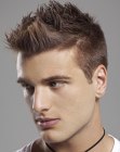 Spiked male hairstyle with shrt sides