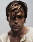 Men's haircut with long textured bangs