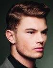 Neat hairstyle with a side part for men