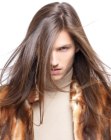 Mid-back length men's hair with straight styling