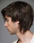 Male rock style haircut for longer hair