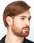 Man wearing his hair smooth with a side part