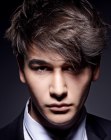 Loose styling and ruffled bangs for men's hair