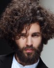 Men's hairstyle with long curls