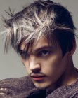 Male look with pointy silver on black hair