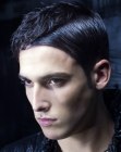 Sleek men's hair with gel styling