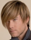 Sleek men's hairstyle with deep bangs