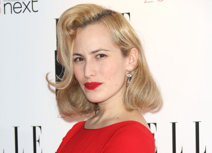 Charlotte Dellal’s retro inspired hairstyle with pin curls