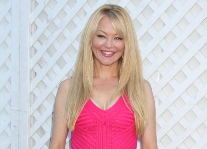 Charlotte Ross, aged over 40 and wearing her hair very long