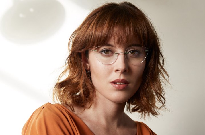 Glasses and a bob hairstyle with bangs
