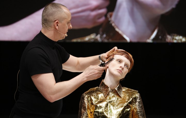 Pure short haircut created on stage during a seminar