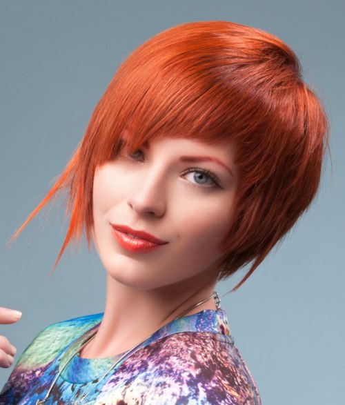 Short red hair with angled bangs