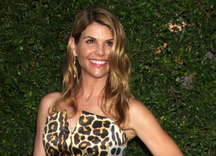 Lori Loughlin's long hairstyle with beachy waves