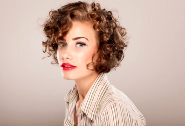 Woman with short curly hair