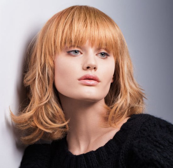 Strawberry blonde shoulder length hairstyle