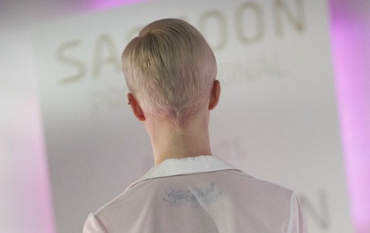 Sassoon cut pixie hair with a very short nape