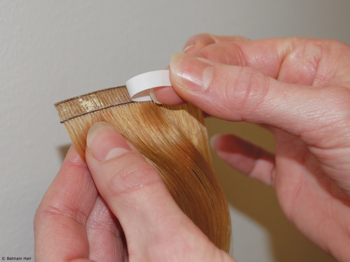 Reusable tape hair extensions made of 100% natural hair