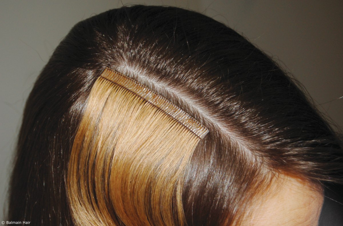 Reusable tape hair extensions made of 100% natural hair