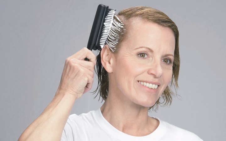 Comb mousse through hair
