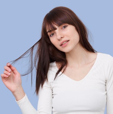 Woman with damaged hair ends