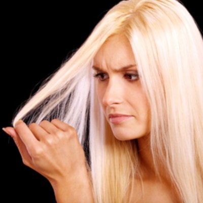 Woman with a hair bleaching problem