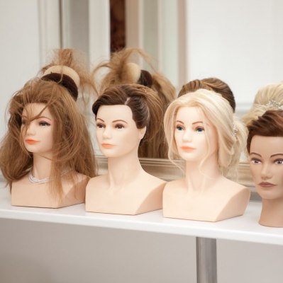 Hairdressing manikins or training heads