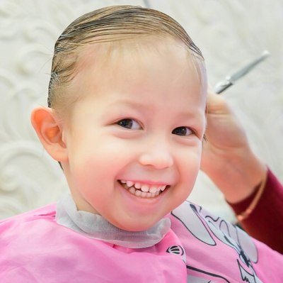 Kid in a hair salon