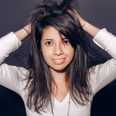 Girl with long hair before a haircut