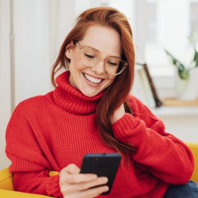 Redhead wearing a red turtleneck