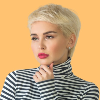 Woman with short hair wearing a striped turtleneck