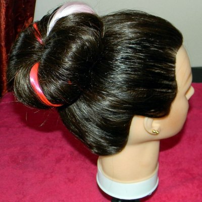 Sock bun with colored hair extensions