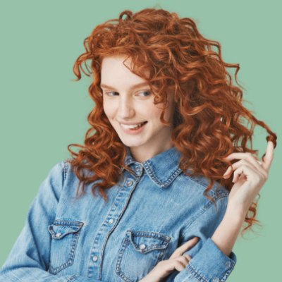 A teenage girl with red hair