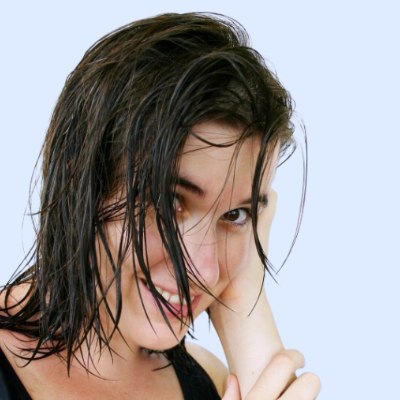 Girl dealing with hard water hair issues