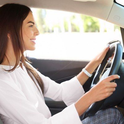 Woman with long hair driving