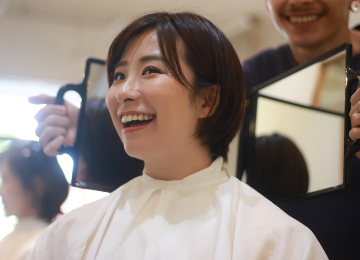 Woman who is happy with her new short hair