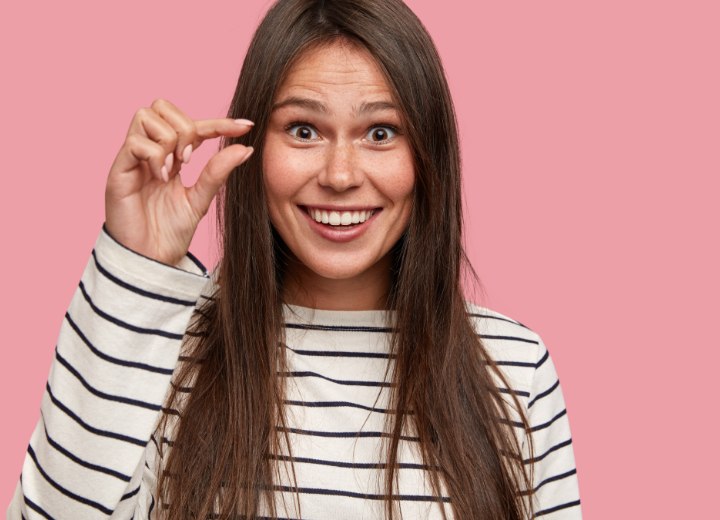 Girl who is worried about trimming her hair