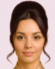 Updo with tendrils along the cheeks