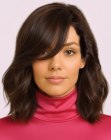 Shoulder-length hairstyle with a side part