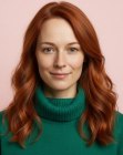 Long copper-toned hair with waves