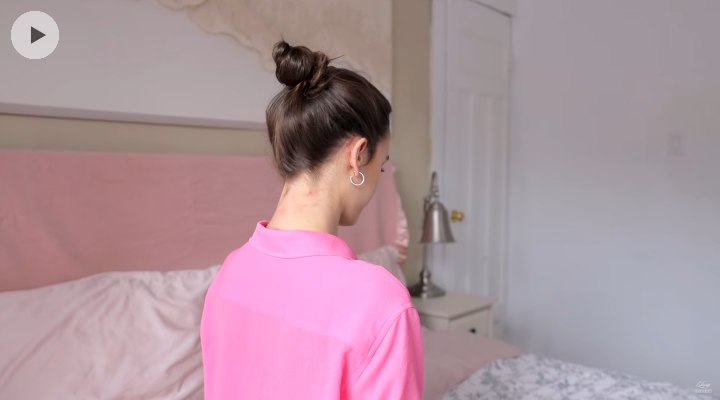 Messy top knot hairstyle